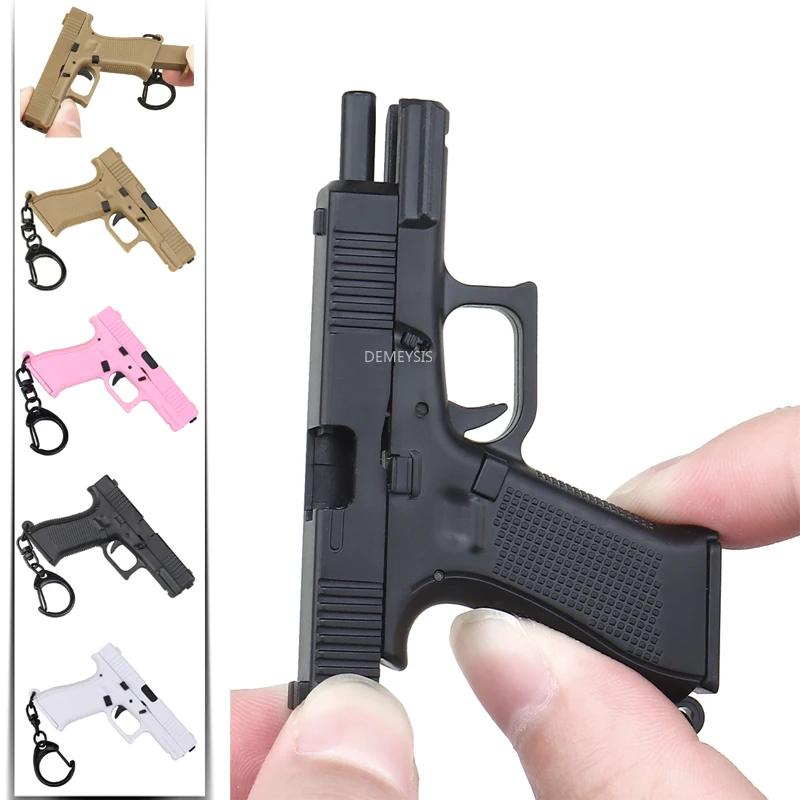Mini Pistols Shape Keychain Re - Home Decor Magazine review and price